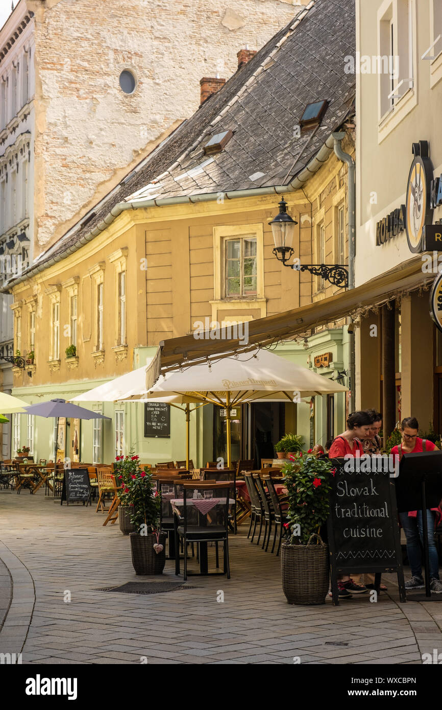 BRATISLAVA, SLOVAKIA - AUGUST 18, 2019: terraces of bars and restaurants in the central Zelena street Stock Photo