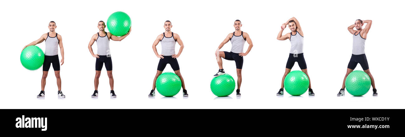 Man with swiss ball doing exercises on white Stock Photo - Alamy