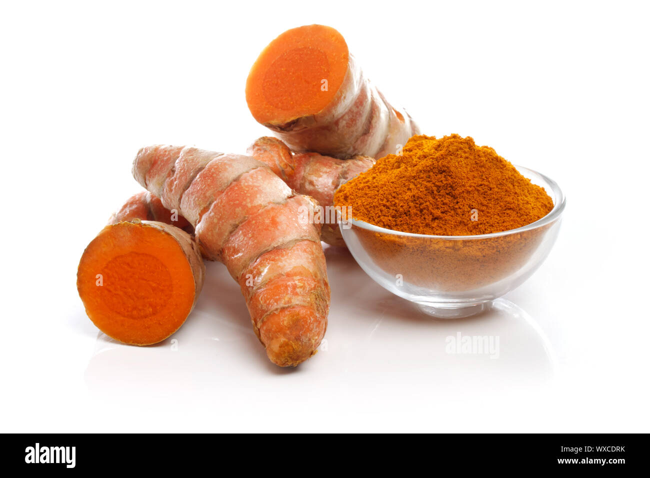 Turmeric roots and powder on white background Stock Photo Alamy