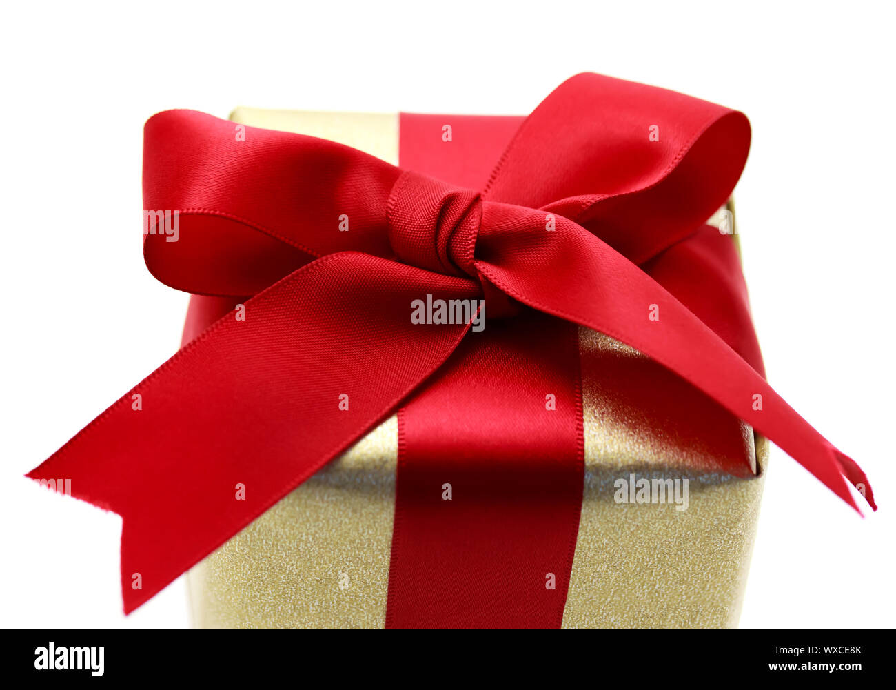 Gift box with red ribbon on white background Stock Photo - Alamy
