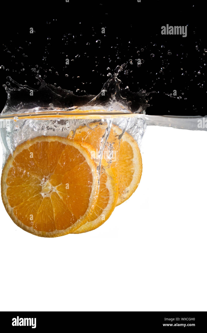 Orange slices in water Stock Photo