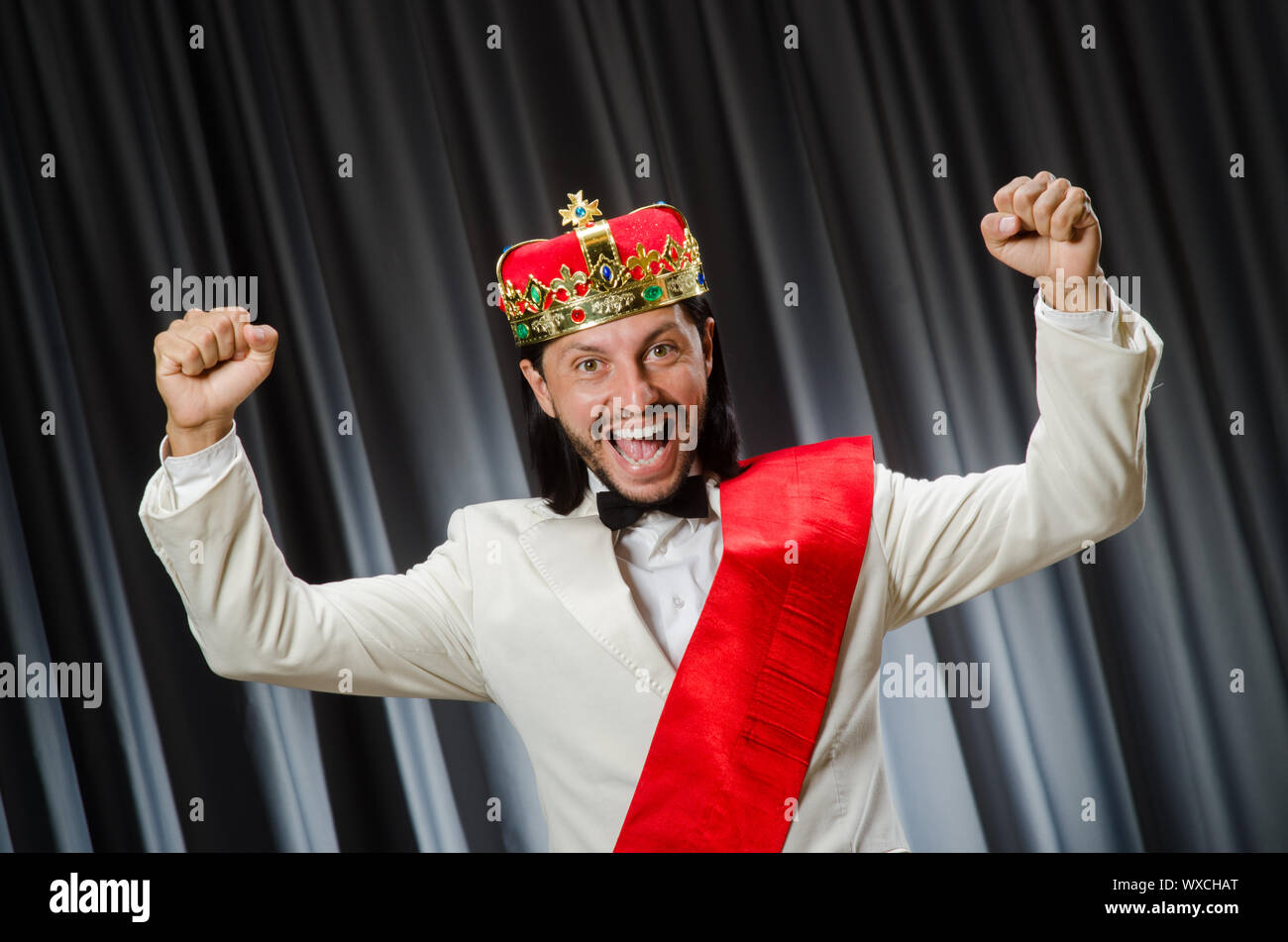 Funny king wearing crown in coronation concept Stock Photo Alamy