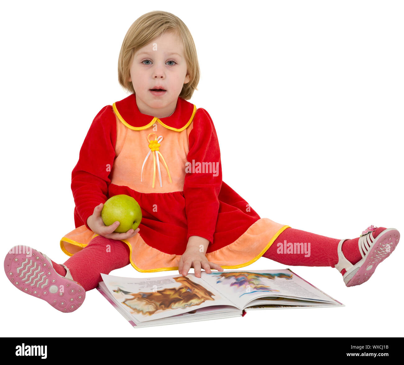 Little girl reading a book on the white background Stock Photo - Alamy