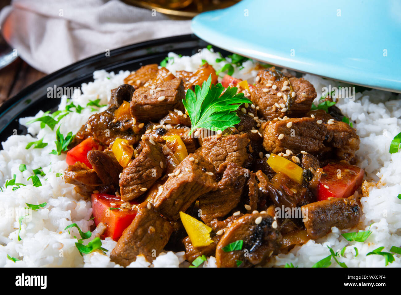 Tajin beef stew with rice paprika and sesame seeds Stock Photo Alamy