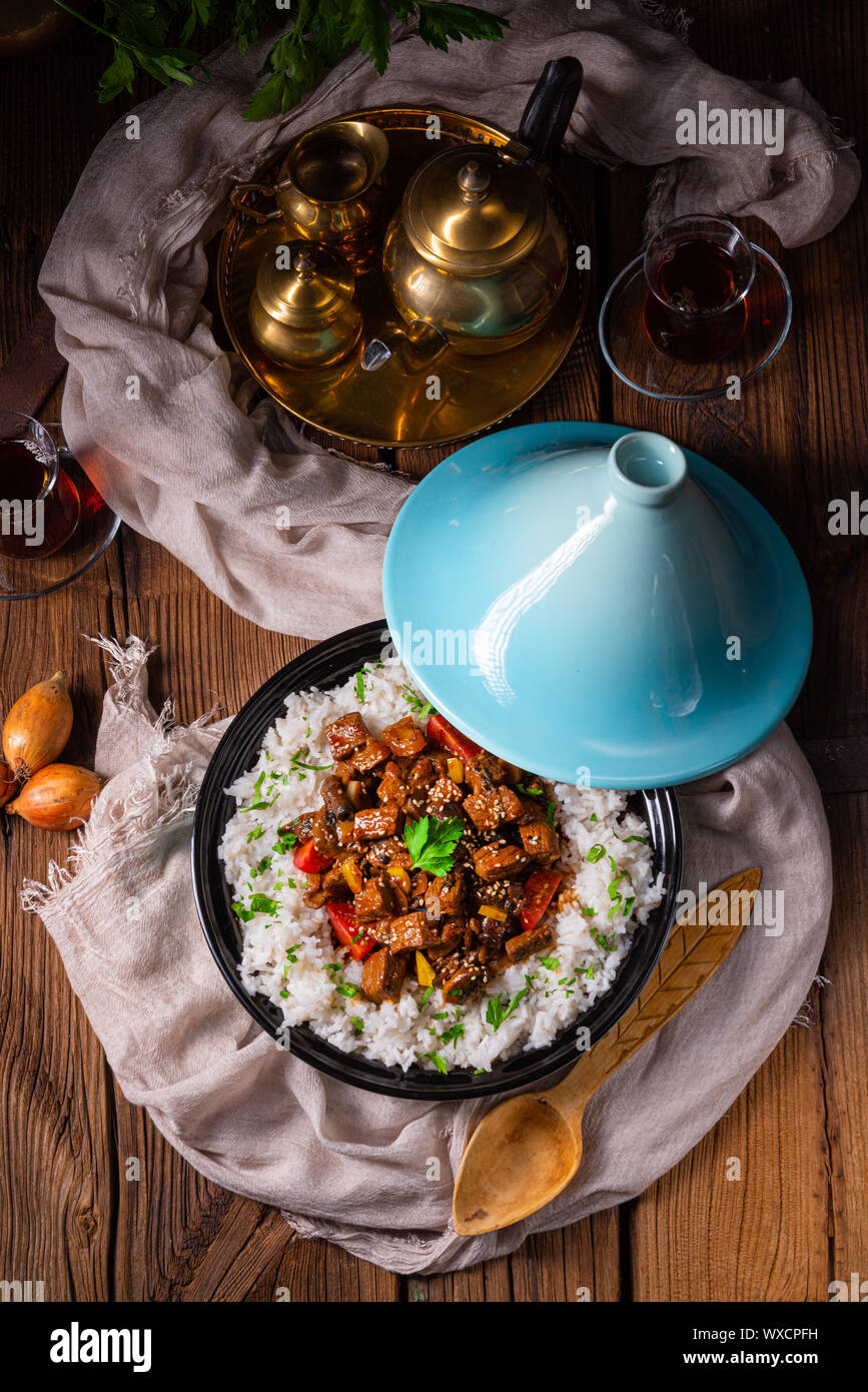 Tajin beef stew with rice paprika and sesame seeds Stock Photo Alamy