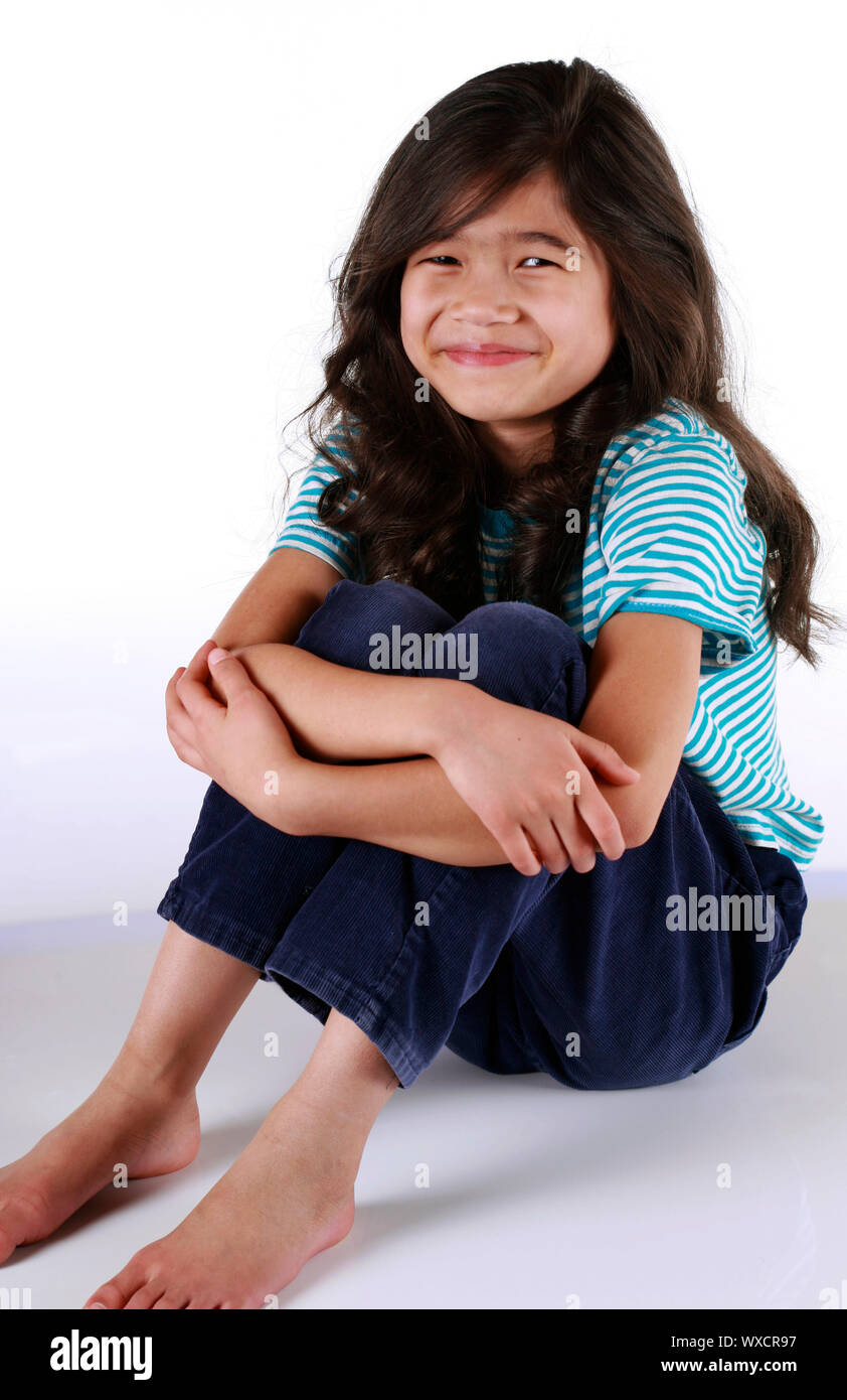 Arms around knees hires stock photography and images Alamy