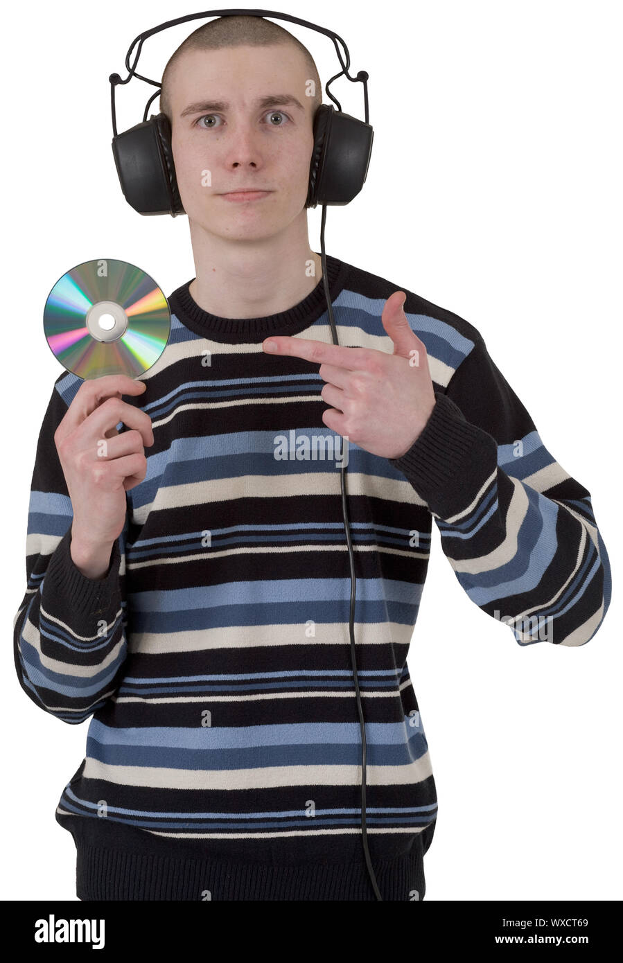 The young guy with ear-phones on a head and a compact disk in a hand Stock Photo