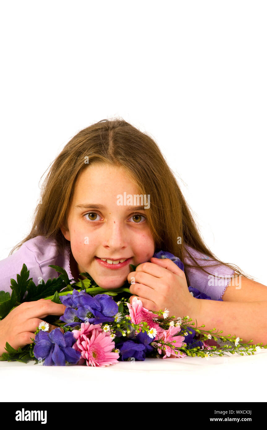 Portrait of a little girl with flower arrangement Stock Photo - Alamy