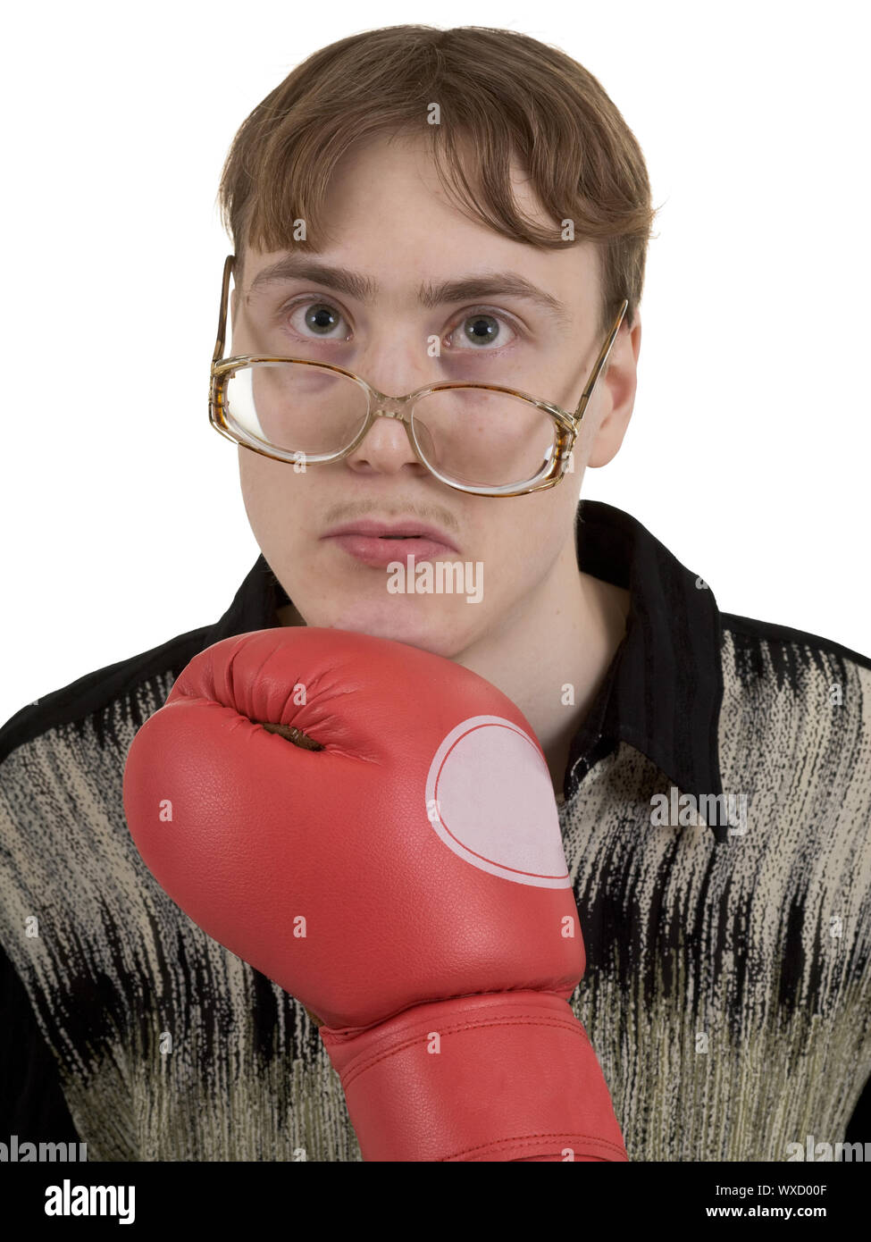 The man in spectacles taking a punch by a boxing glove Stock Photo Alamy