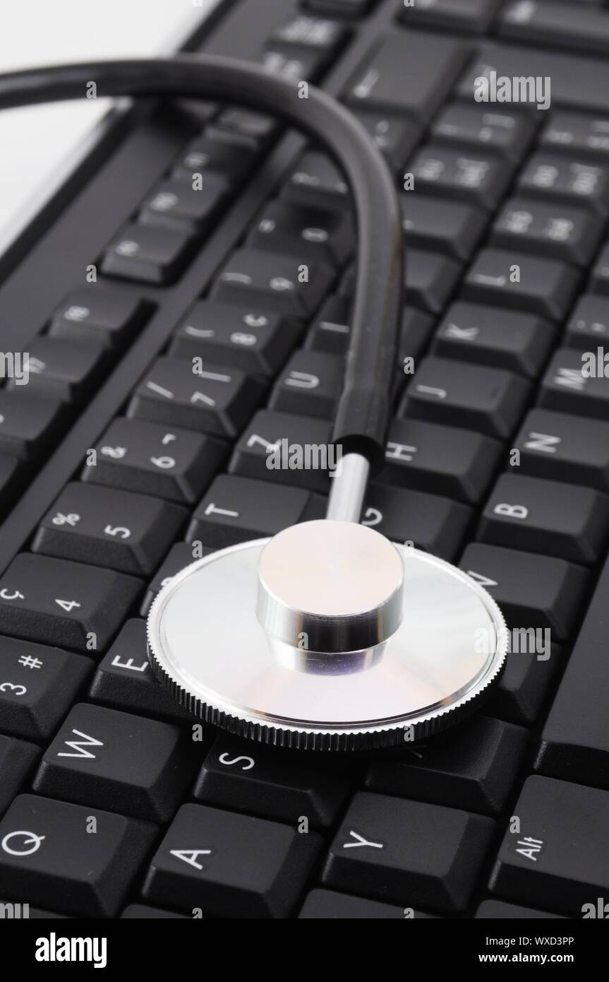 stethoscope on keyboard showing computer problem concept Stock Photo ...
