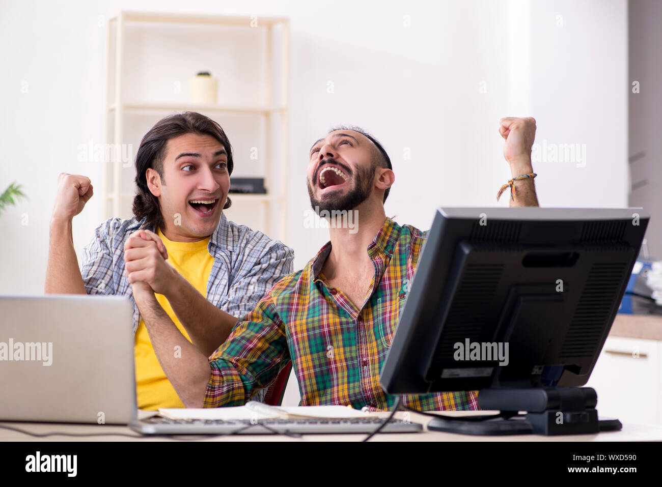 Two it specialists working in the office Stock Photo
