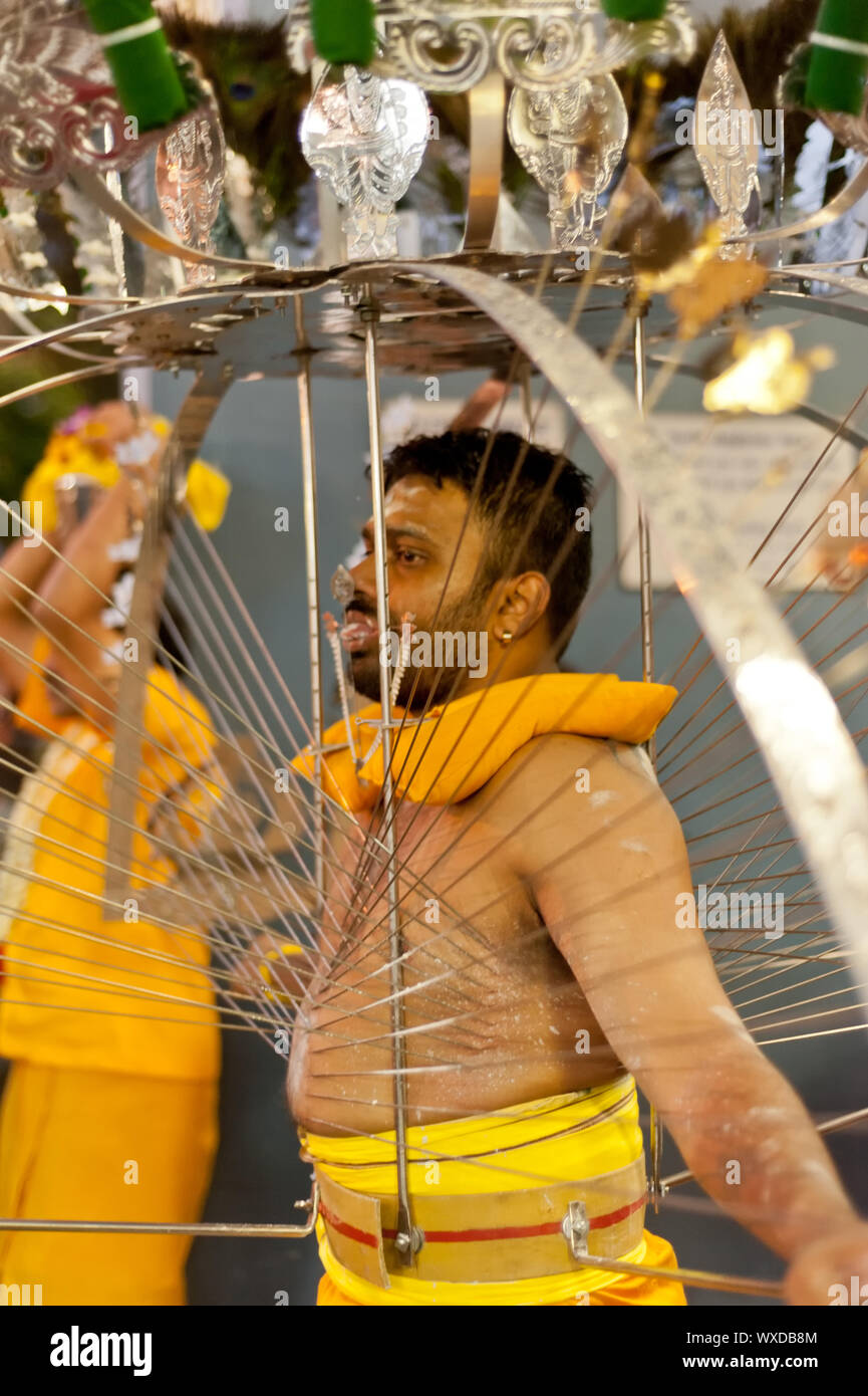 SINGAPORE 2013 JANUARY 27 Devotee carrying a kavadi at Thaipusam