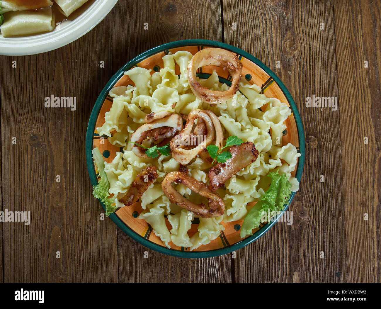 Pasta Campanelle con calamari Stock Photo