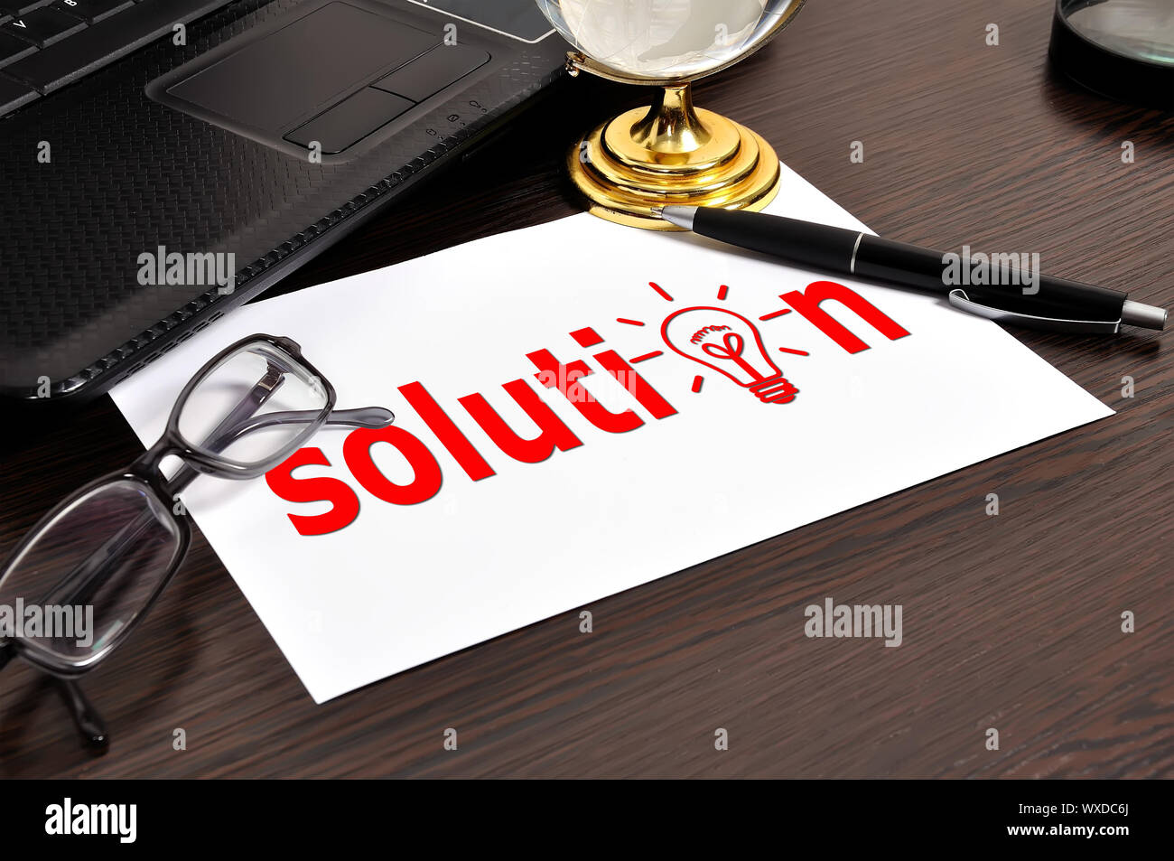 workplace with solution on paper Stock Photo - Alamy