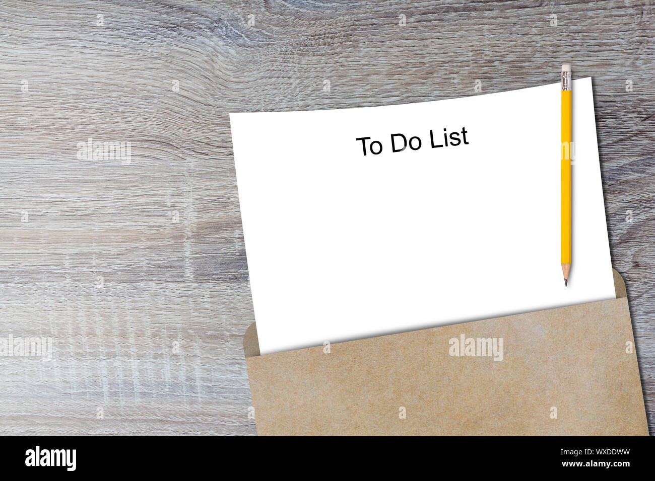 To do list concept, white paper and yellow pencil on wood background Stock Photo Alamy