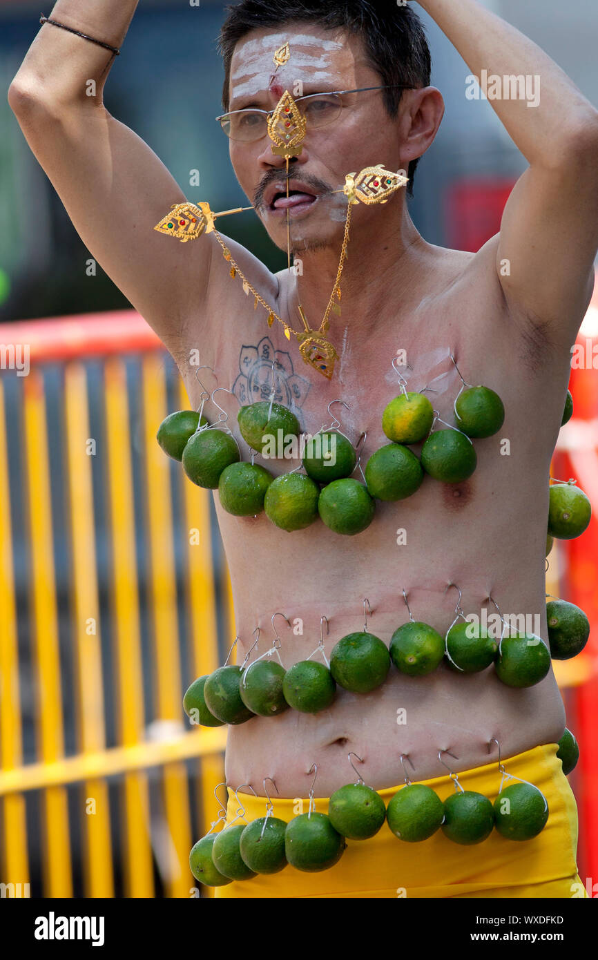 SINGAPORE JANUARY 27 Male Hindu devotee carrying a kavadi at