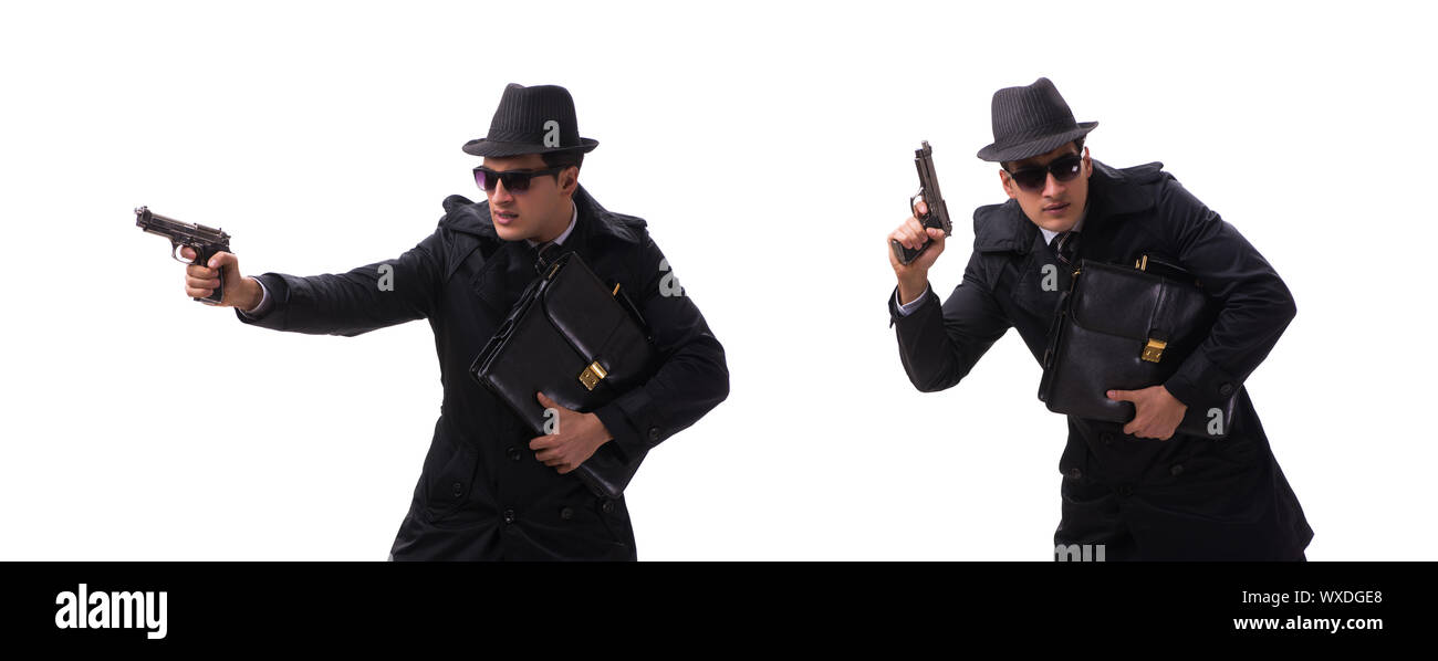 Man spy with handgun isolated on white background Stock Photo