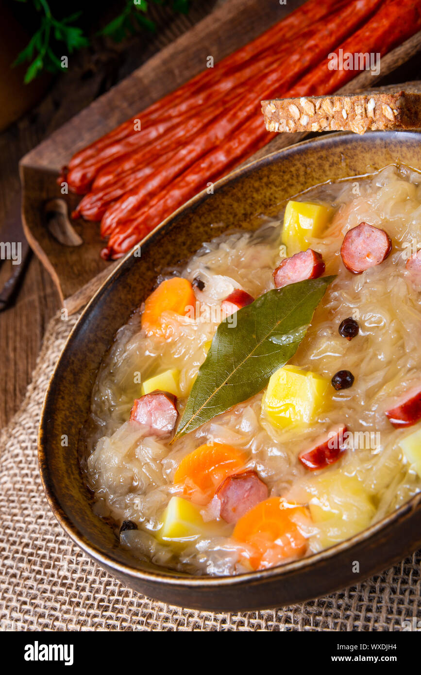 rustic sauerkraut soup with bacon and sausage Stock Photo Alamy