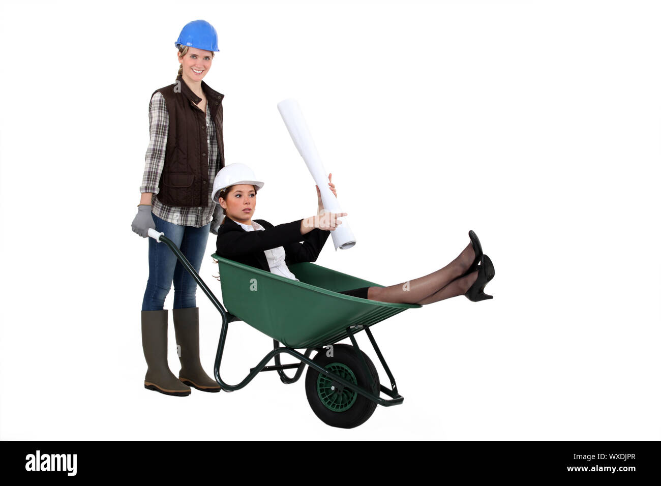 An architect getting a wheelbarrow ride Stock Photo - Alamy
