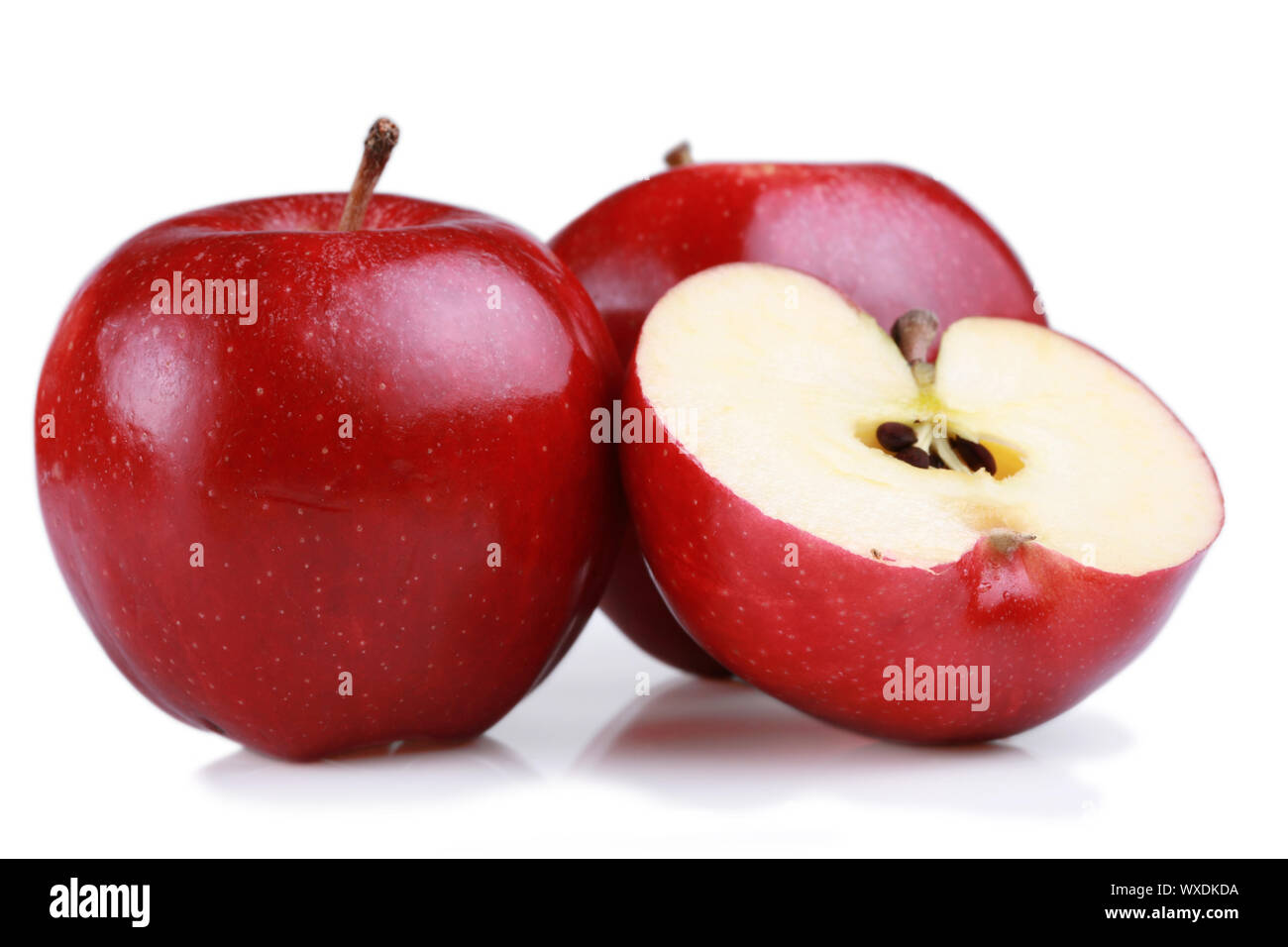 Red gala apples, one cut open to show seeds Stock Photo Alamy