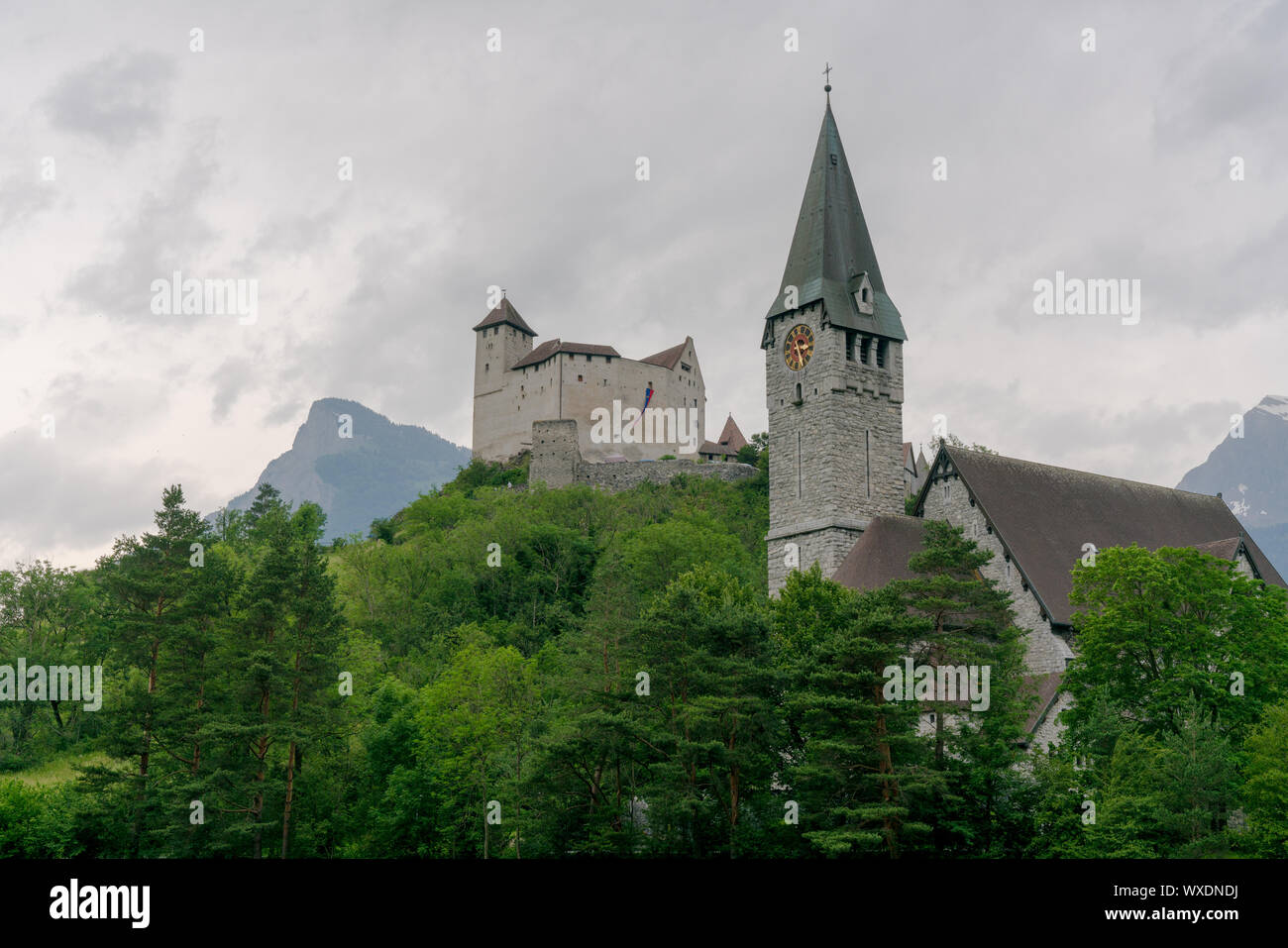 Balzers, FL / Liechtenstein - 9 June 2019: view of the historic Gutenberg Castle and Sankt Nikolaus Stock Photo