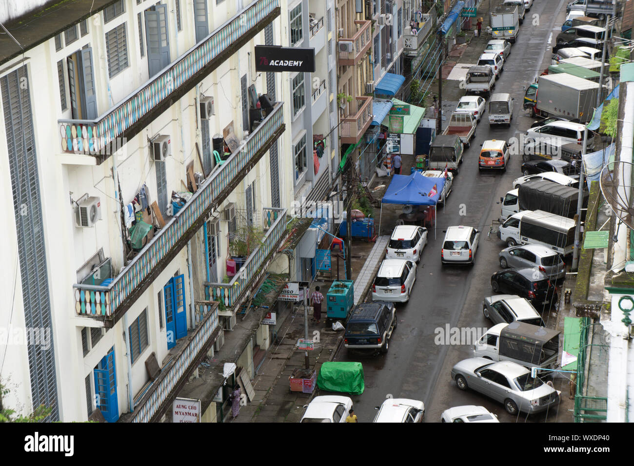 A busy city street in downtown Yangon City, Myanmar Stock Photo