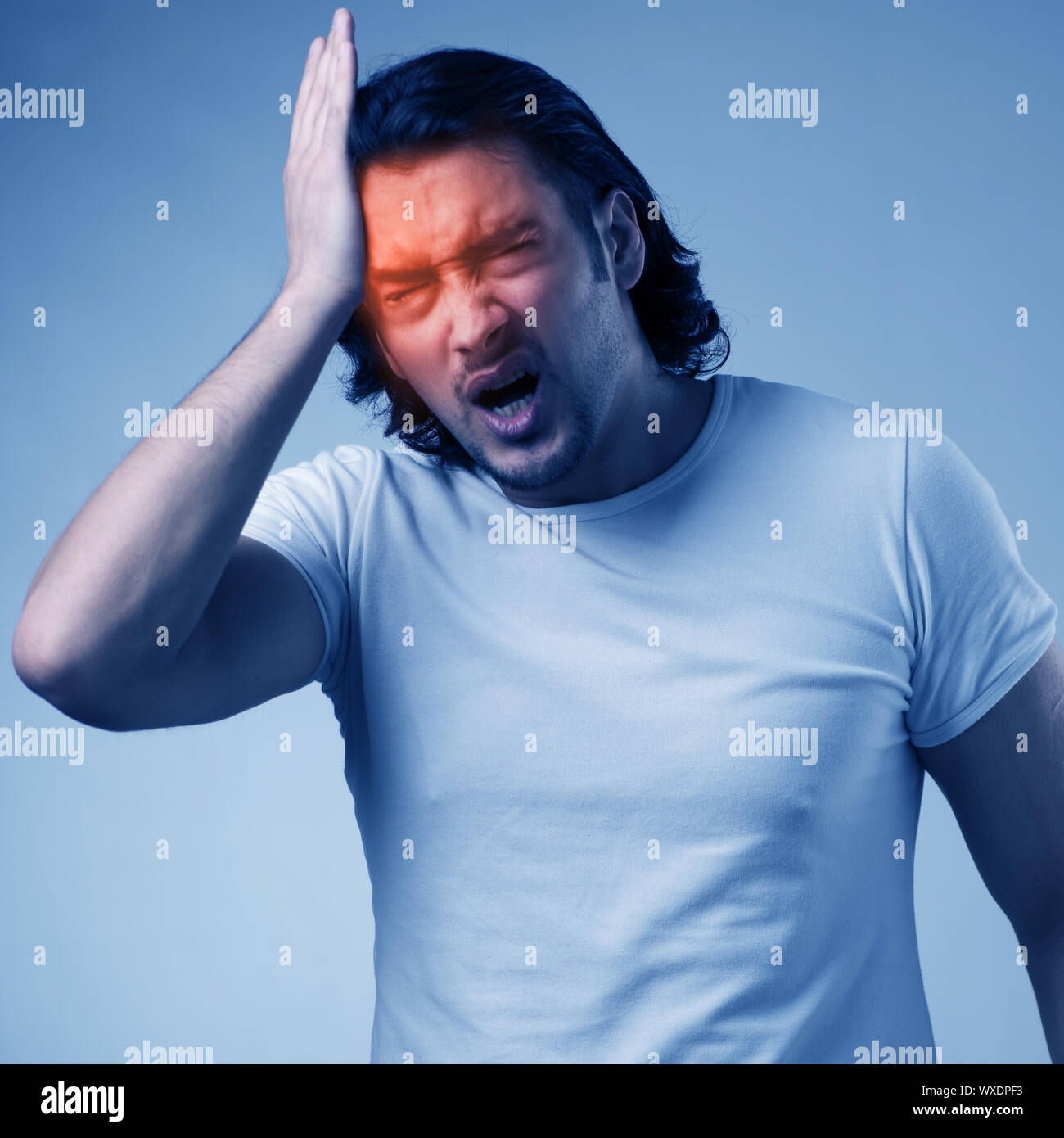 Man suffering from acute headache Stock Photo