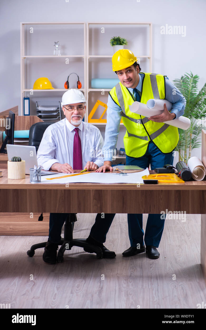 Two architects working on the project Stock Photo