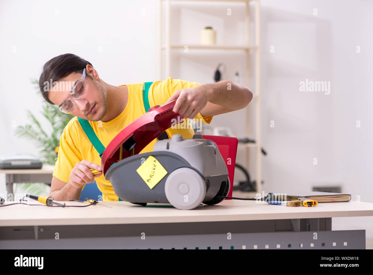 Broken vacuum cleaner hires stock photography and images Alamy