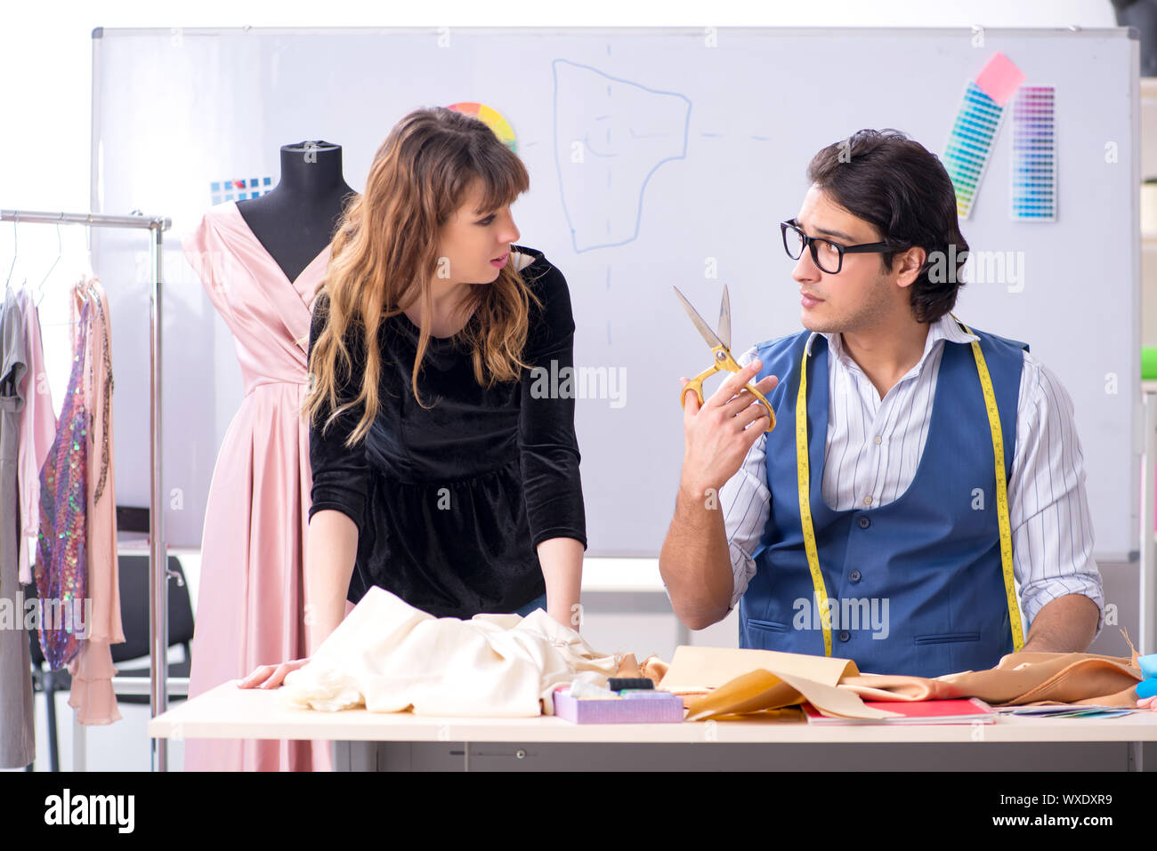 Young tailors working in workshop Stock Photo