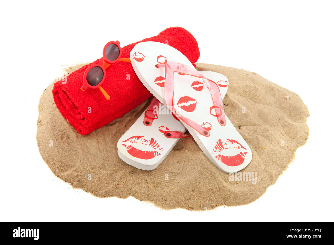 Flip flops and sunglasses on the beach Stock Photo - Alamy
