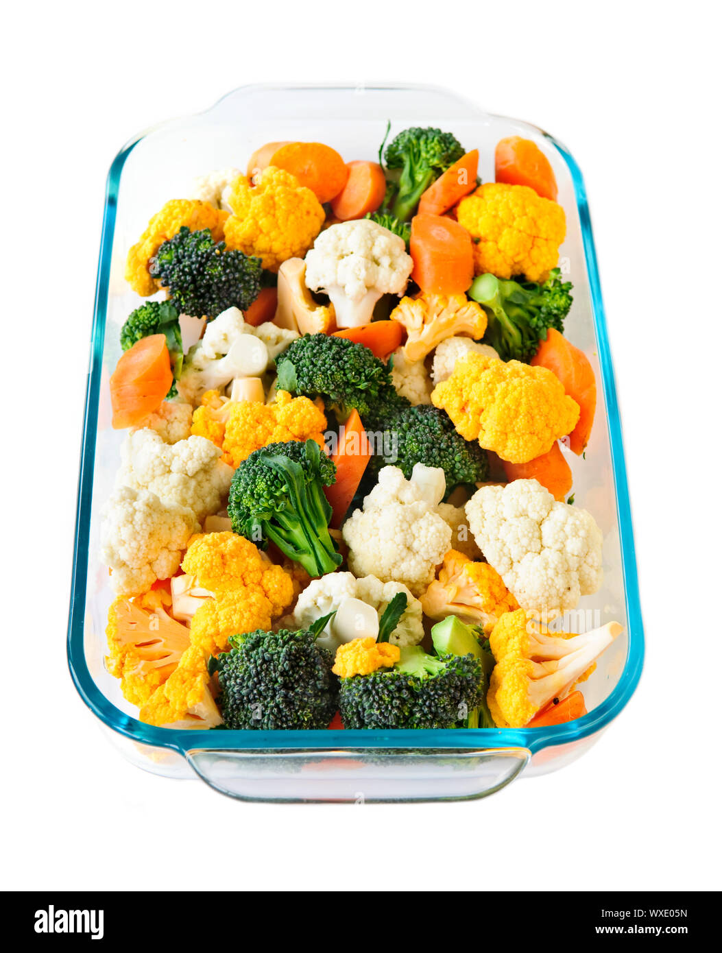 Raw cut vegetables in glass roasting pan Stock Photo Alamy