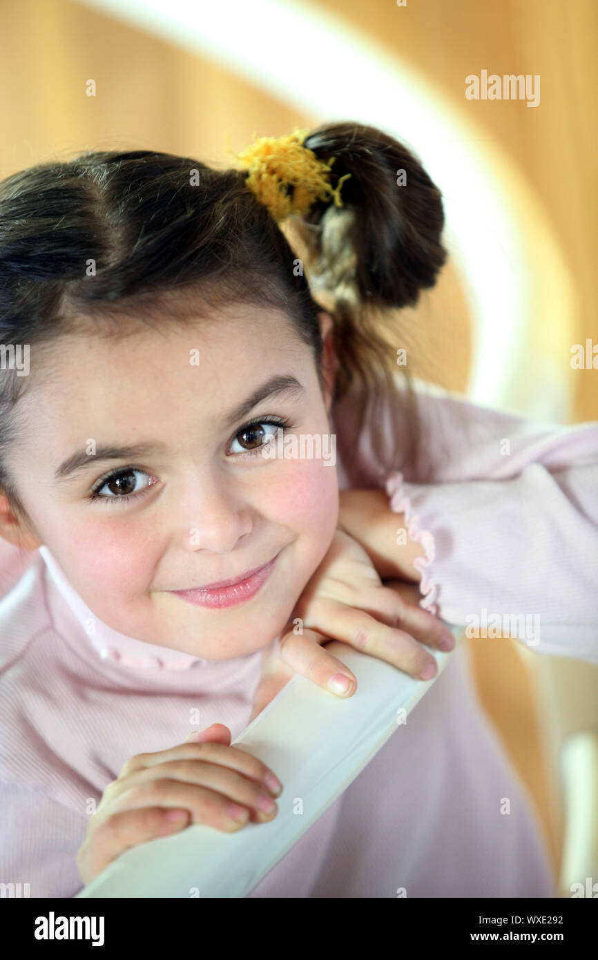 Little girl on a staircase Stock Photo Alamy