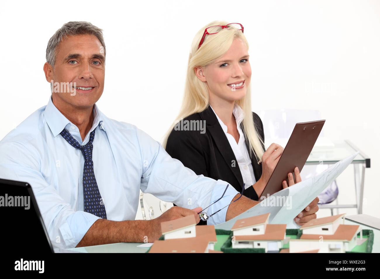 real estate manager and his assistant Stock Photo Alamy
