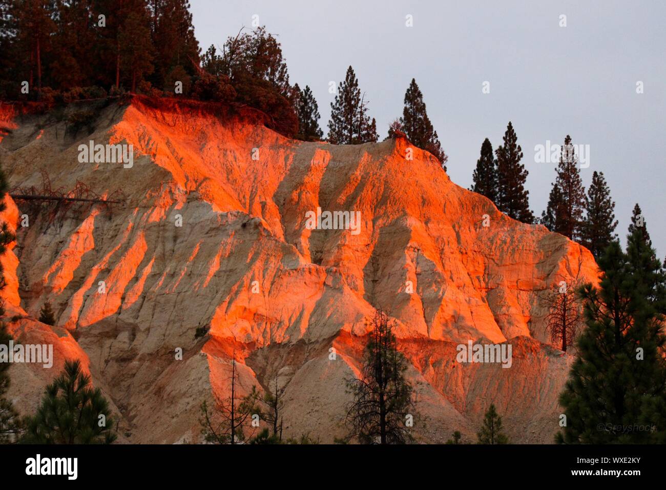 The bluffs from a hydraulic mine in California at sunset. Stock Photo