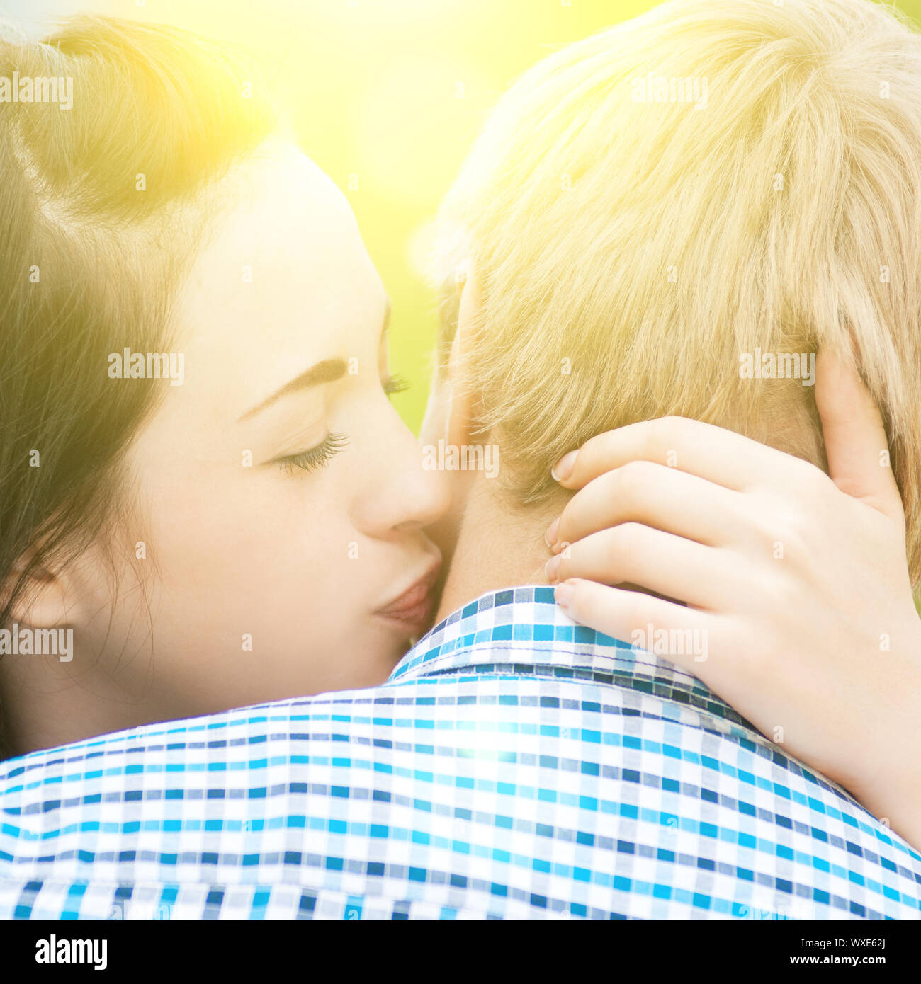 Portrait of a beautiful young happy smiling couple - hugging with love ...