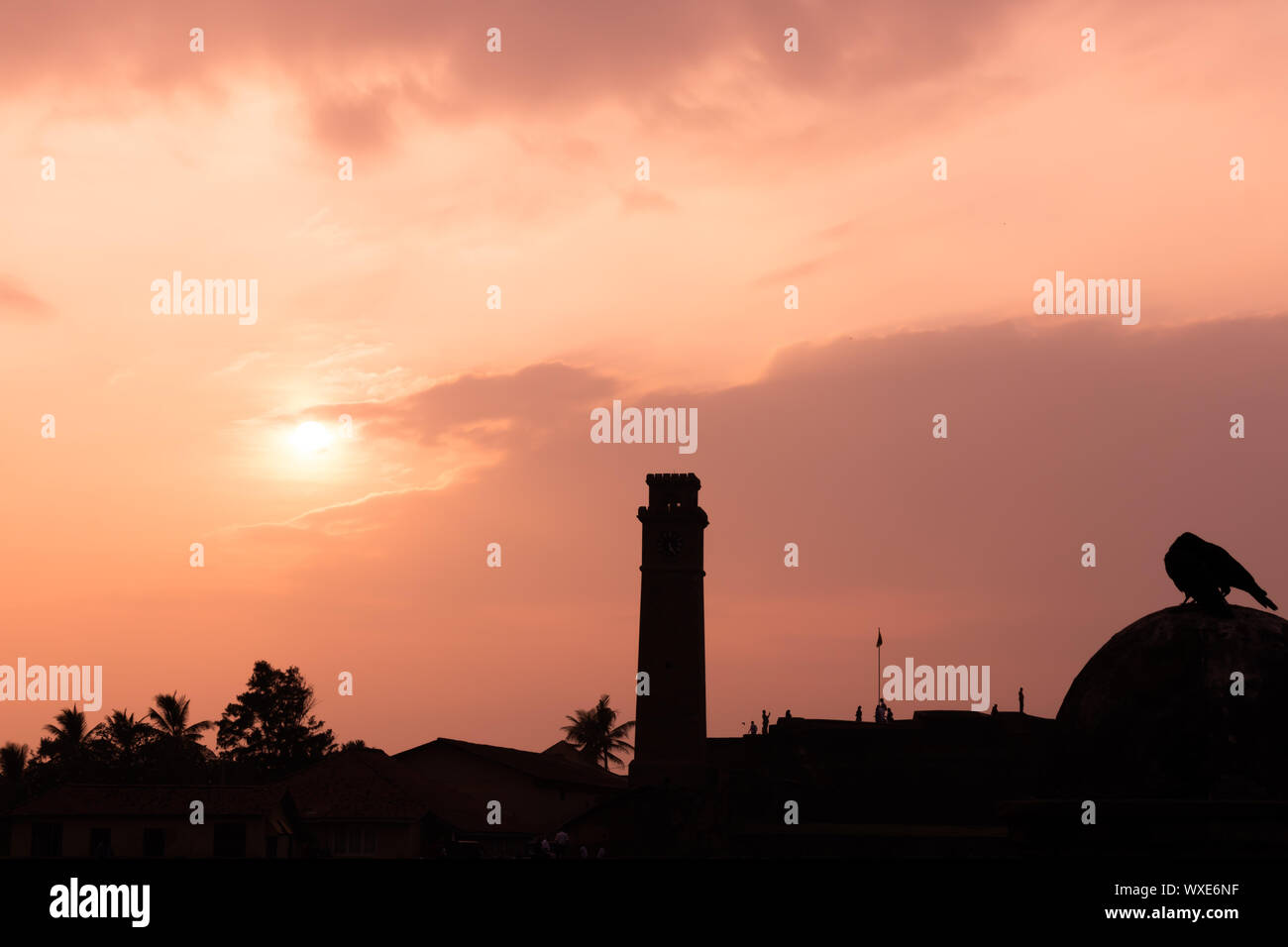 sunset with clock tower gall sri lanka Stock Photo Alamy