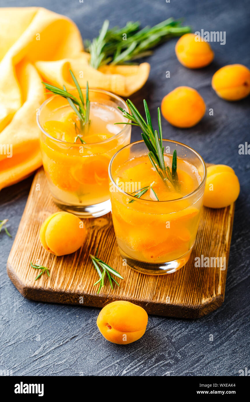 Summer drinks, rosemary aprcot cocktails. Stock Photo