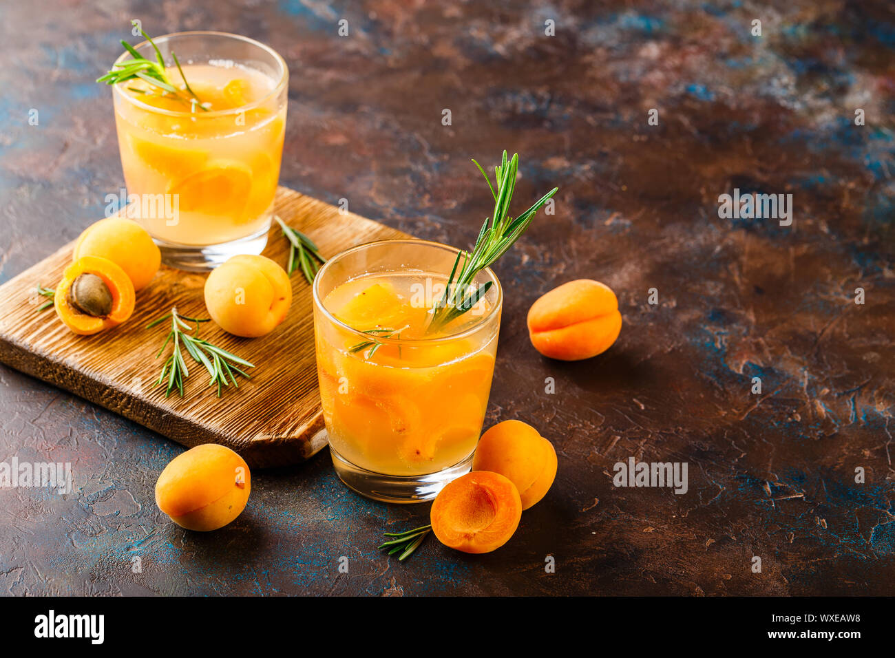 Summer drinks, rosemary aprcot cocktails Stock Photo Alamy