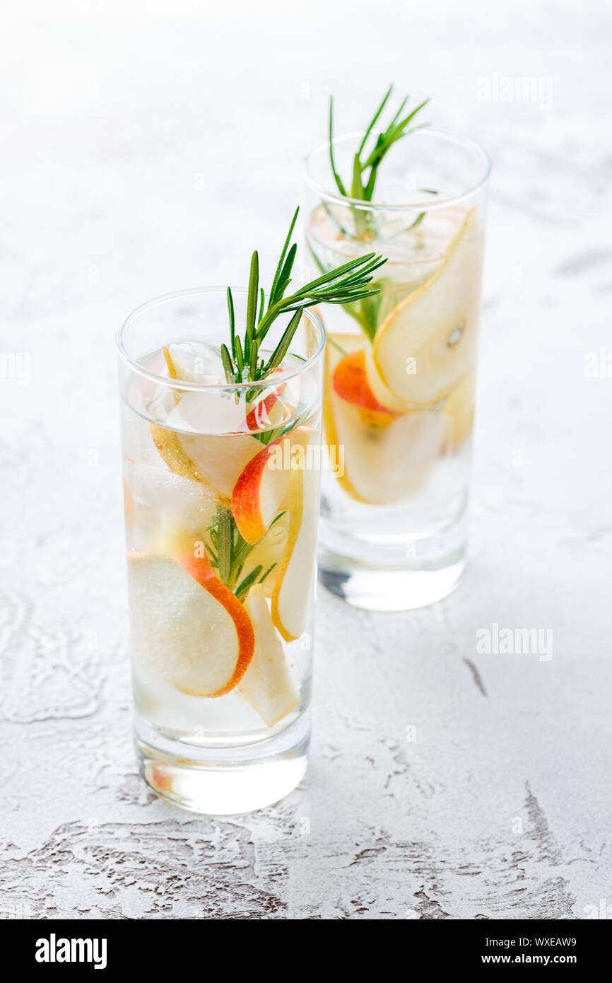Summer drinks, rosemary pear cocktails. Stock Photo