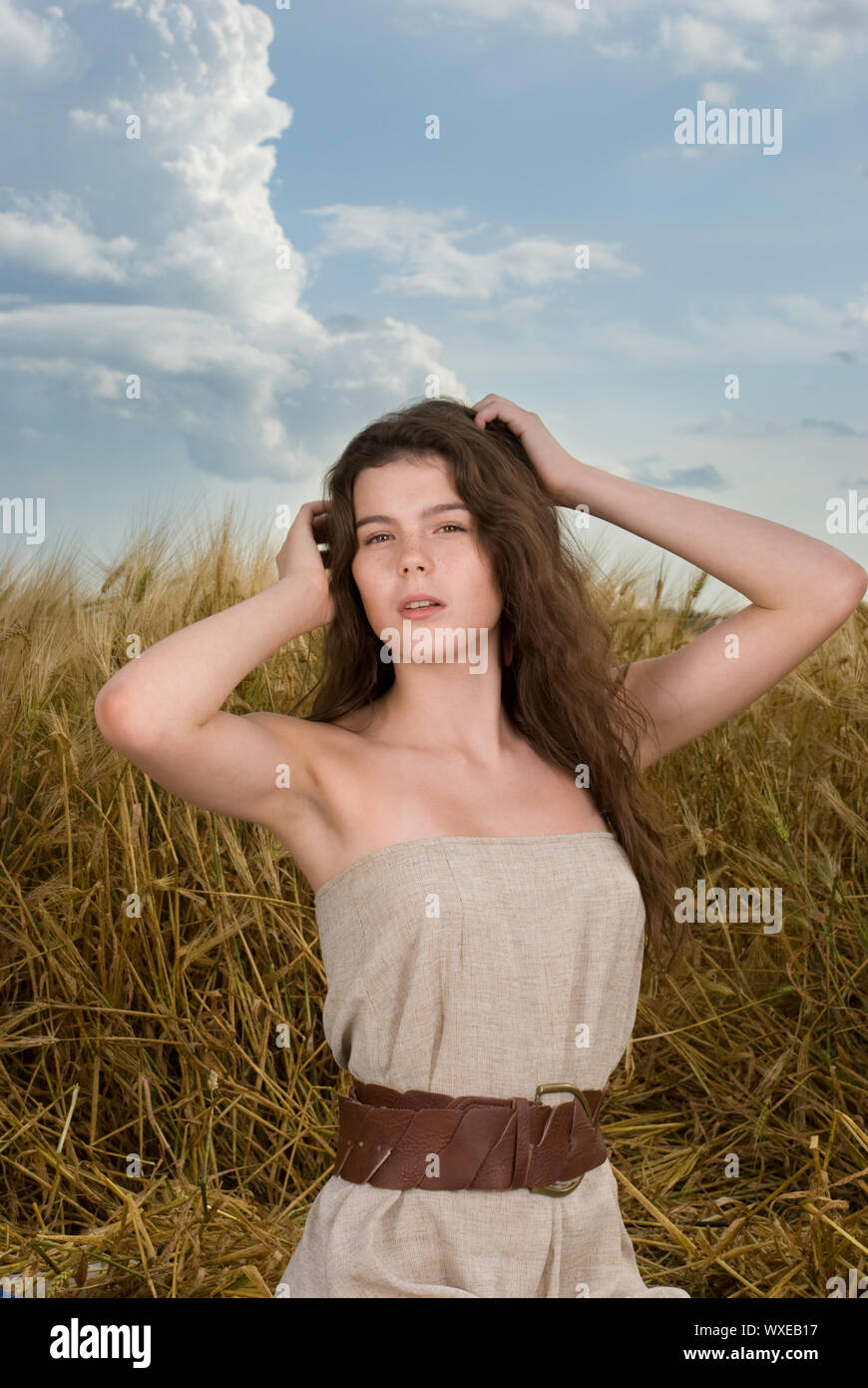 Beautiful slavonic girl on picnic in wheat field Stock Photo - Alamy