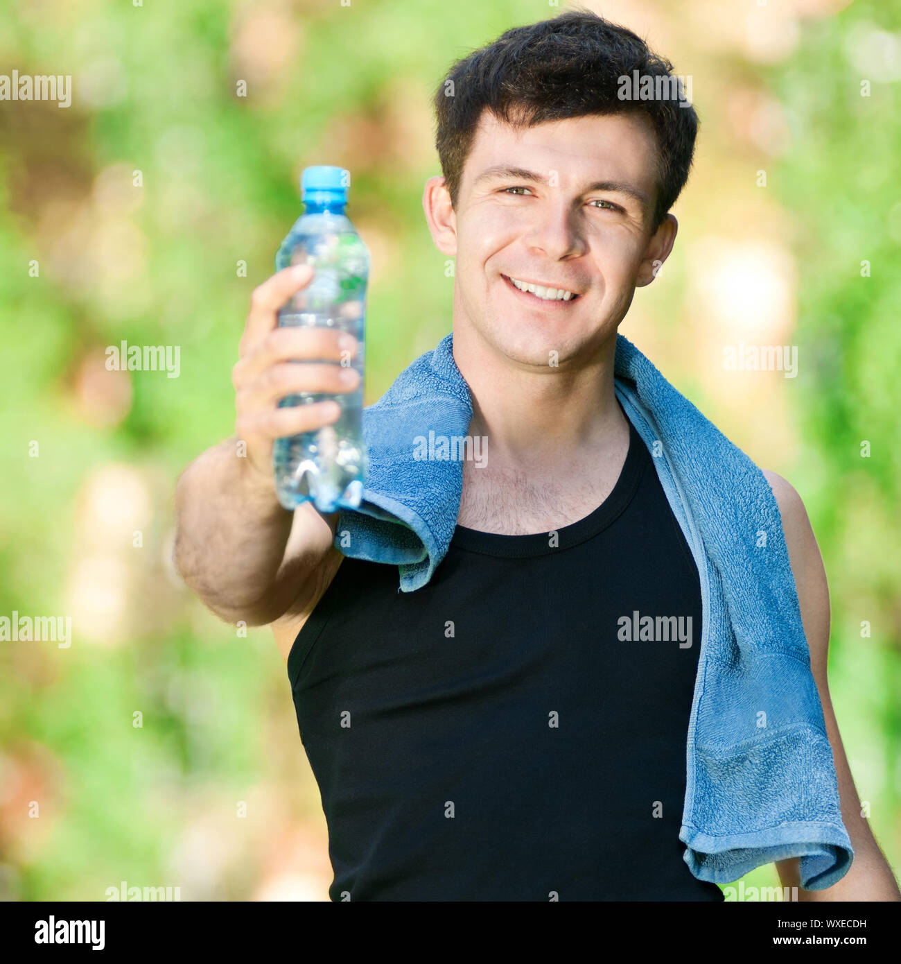 Man drinking water after fitness exercise Stock Photo Alamy