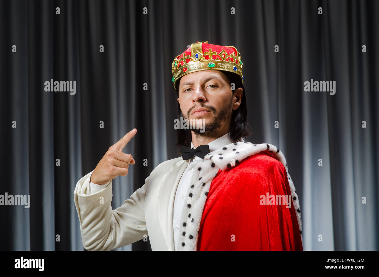 Funny king wearing crown in coronation concept Stock Photo Alamy