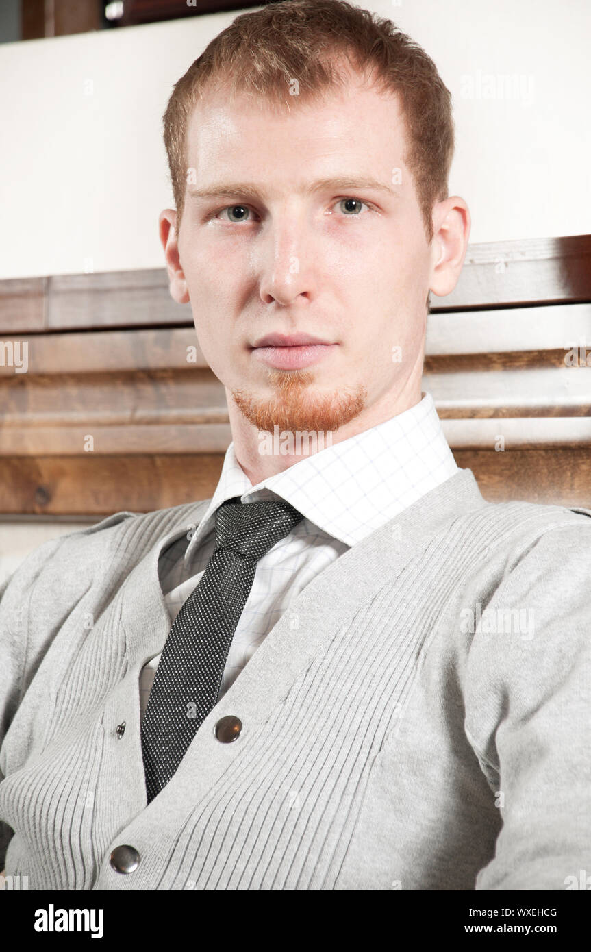 Sure young business man in office rest room interior Stock Photo Alamy