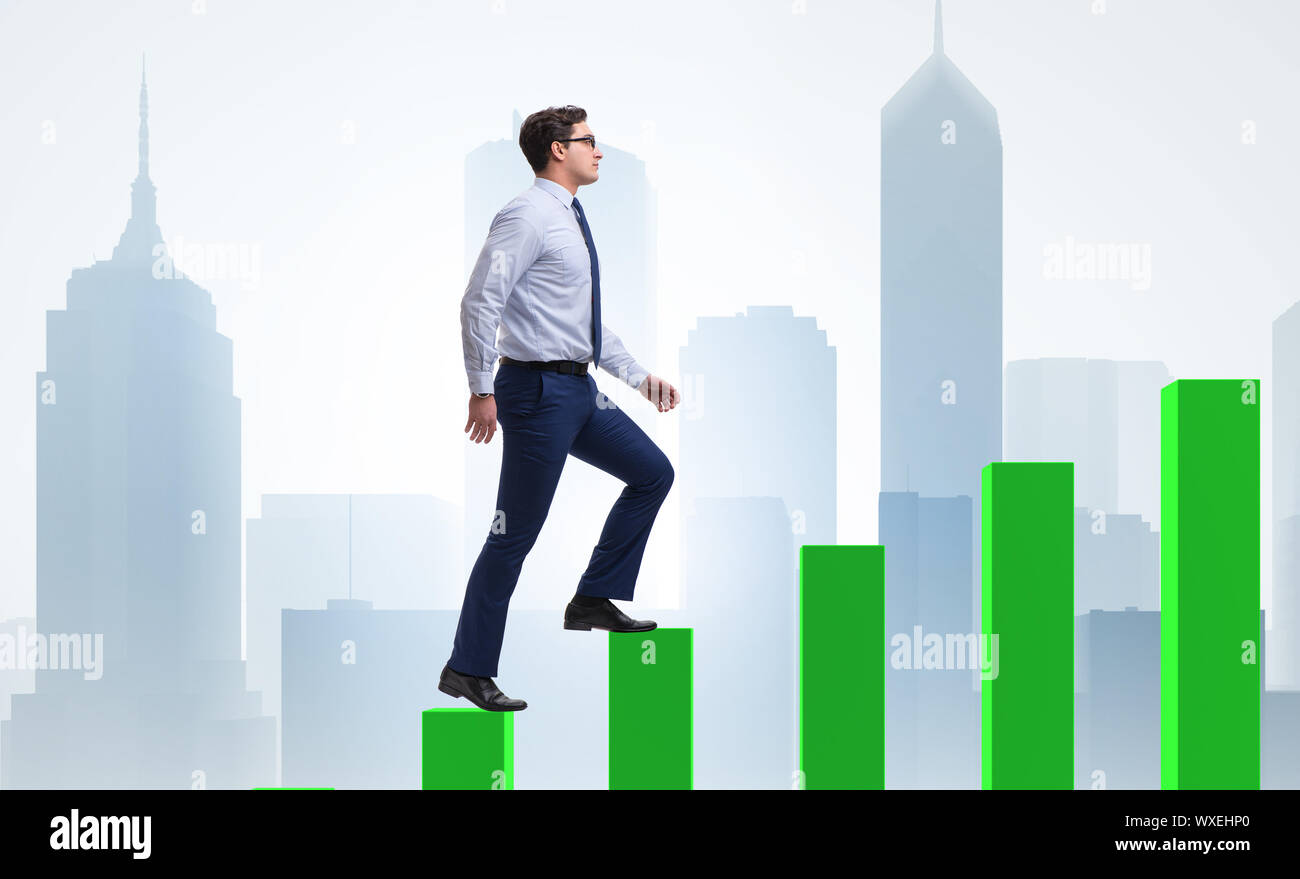 Businessman going up the bar chart in growth concept Stock Photo - Alamy