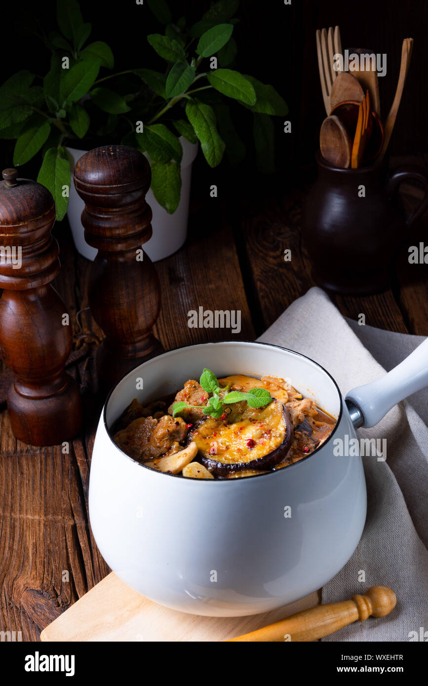 Veal goulash with baked aubergine and herbs Stock Photo - Alamy