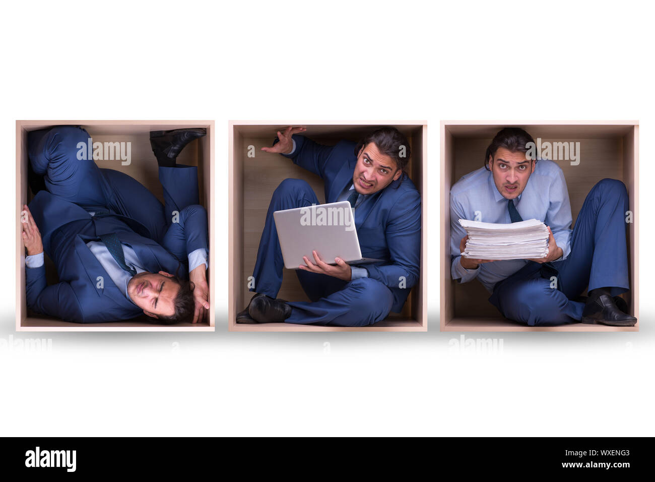 Employee working in tight space Stock Photo