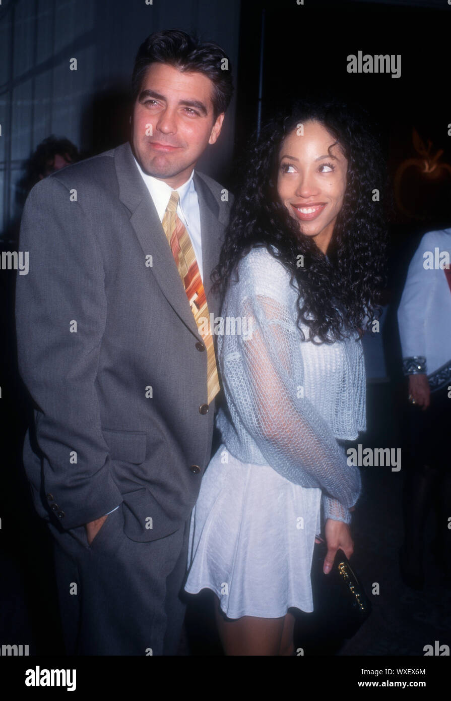 Beverly Hills, California, USA 11th December 1994 Actor George Clooney and actress Kimberly Russell attend the Hollywood Women's Press Club's 54th Annual Golden Apple Awards on December 11, 1994 at Beverly Hilton Hotel in Beverly Hills, California, USA.  Photo by Barry King/Alamy Stock Photo Stock Photo