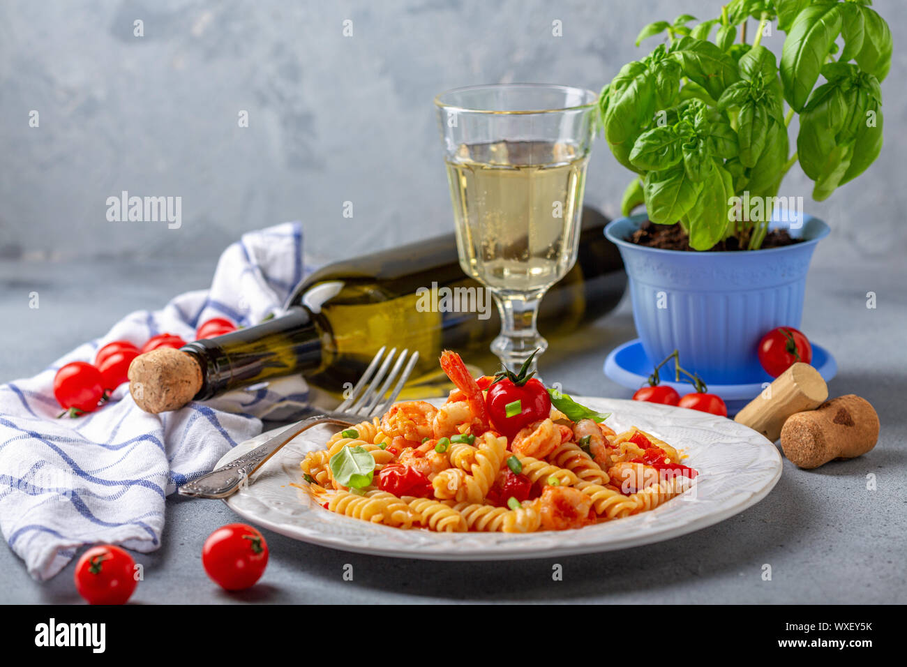 Pasta with tomato sauce and shrimp. Stock Photo