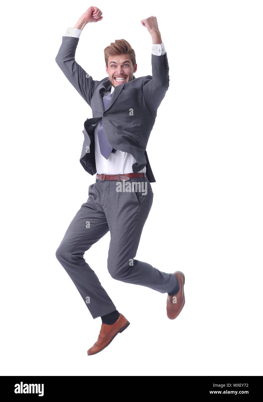 in full growth. happy businessman showing his success Stock Photo